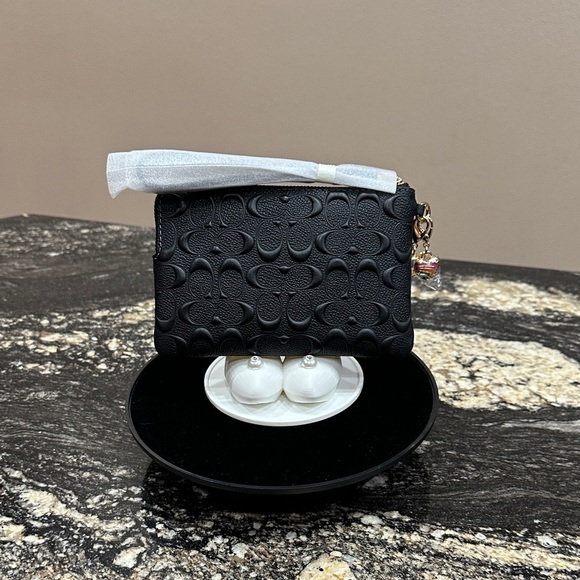 Coach Embossed Wristlet - Picture 2 of 11